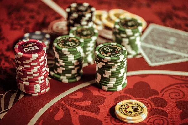 Live dealer studio setup with multiple camera angles for Caribbean Stud Poker